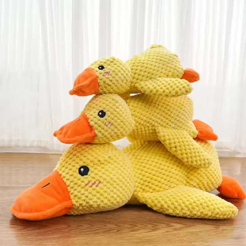Dog sleeping with a dog hug duck toys to relieve boredom of little yellow duck pet interactive plush doll pet supplies